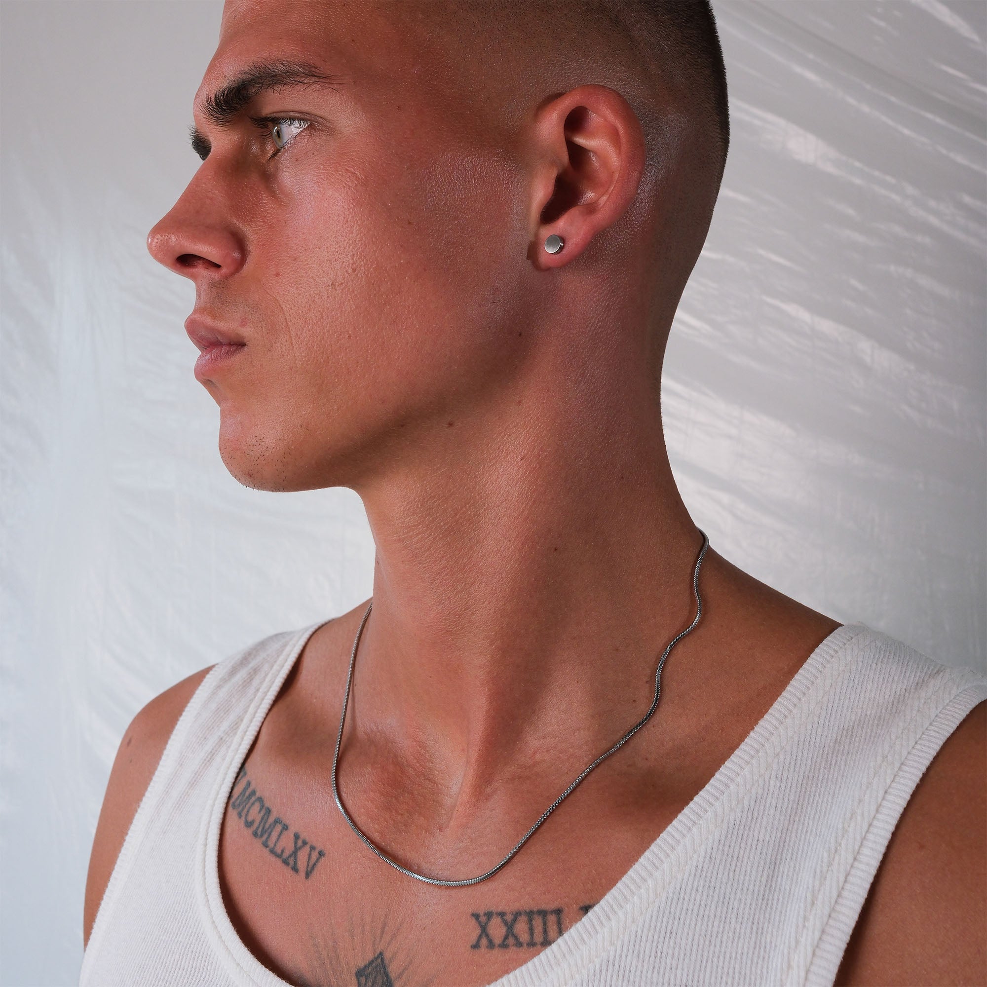 K12 - SILVER STEEL STUD EARRING